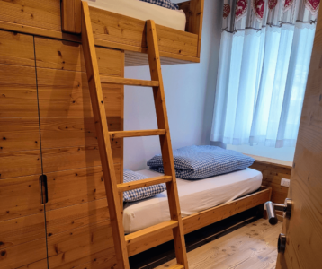 Camera con letto a castello in casa Peter